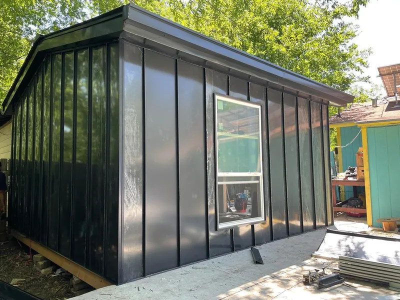 Black standing seam metal wall panels for Metal Roof Installation in Blackwell