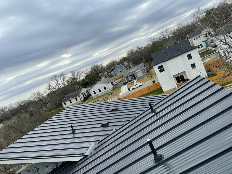 Standing seam metal roof panels with vents for Skylight Repair in Blackwell